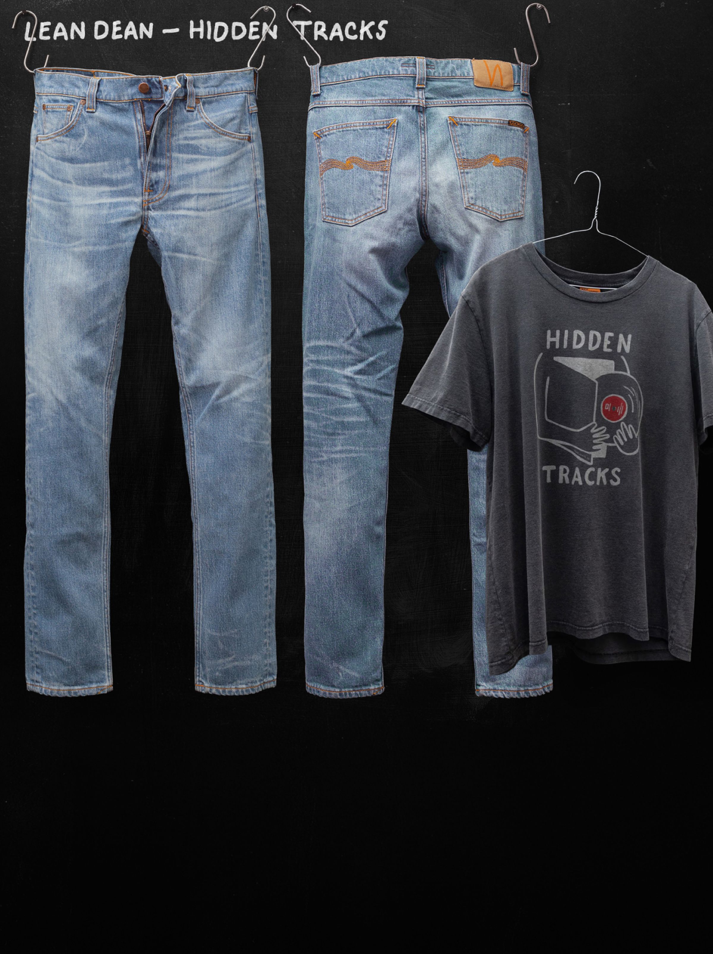 Blue jeans displayed front and back, alongside a black T-shirt with "Hidden Tracks" and a vinyl graphic, all against a black background.