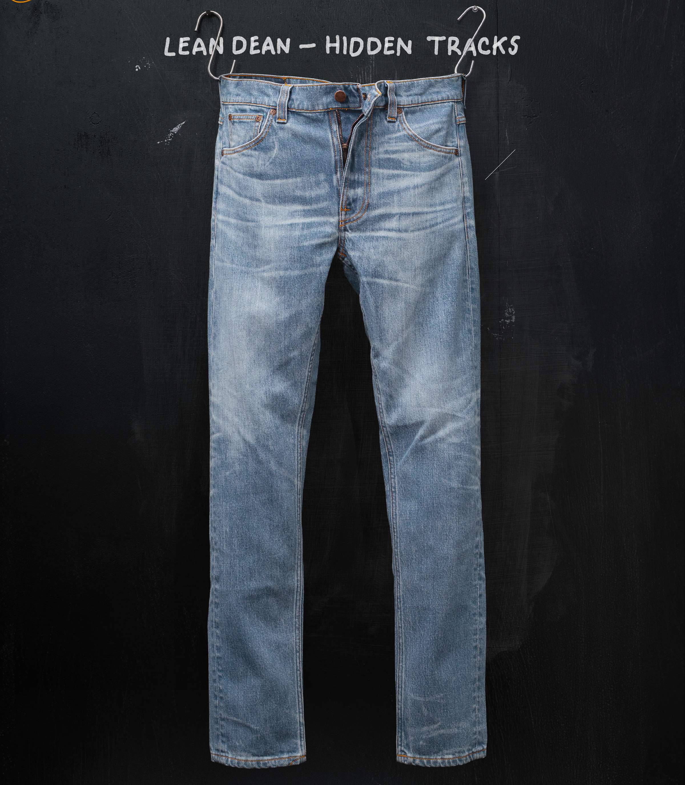 Blue jeans with a slightly worn look, displayed against a dark background with the text "Lean Dean - Hidden Tracks" above.