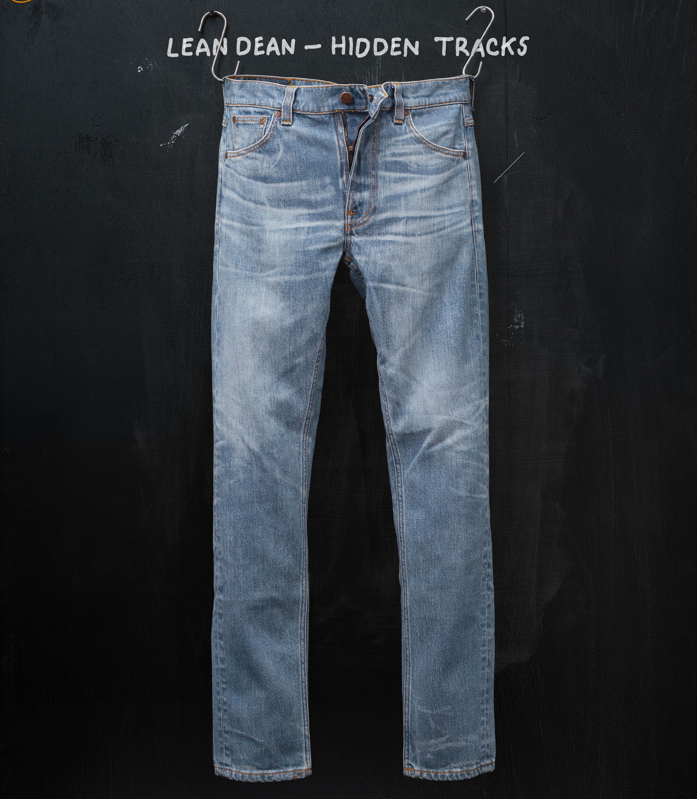 Blue jeans with a slightly worn look, displayed against a dark background with the text "Lean Dean - Hidden Tracks" above.