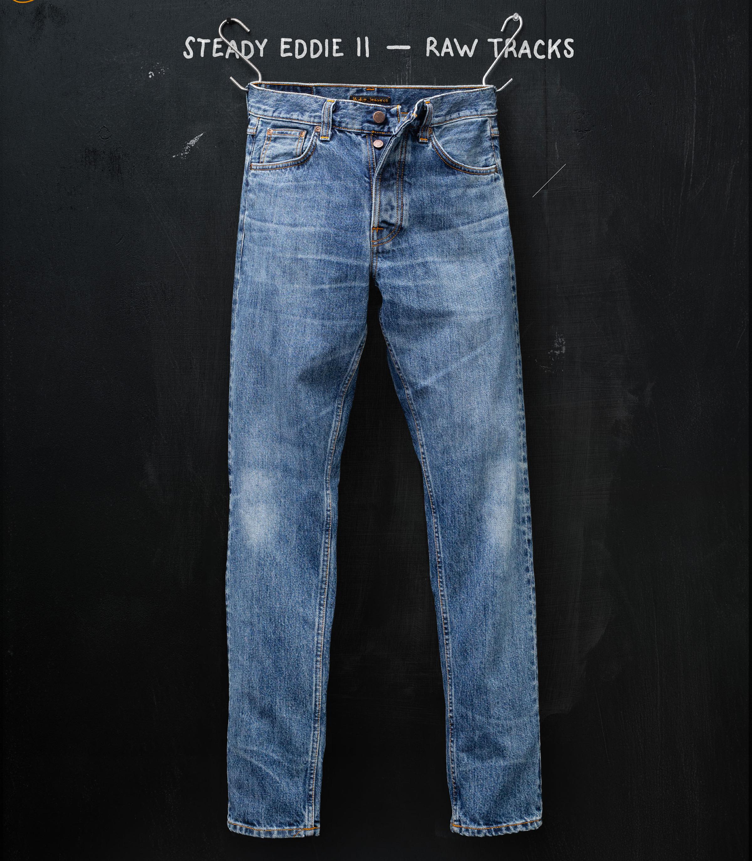 A pair of blue jeans hangs against a dark background with the text "Steady Eddie II - Raw Tracks" above.
