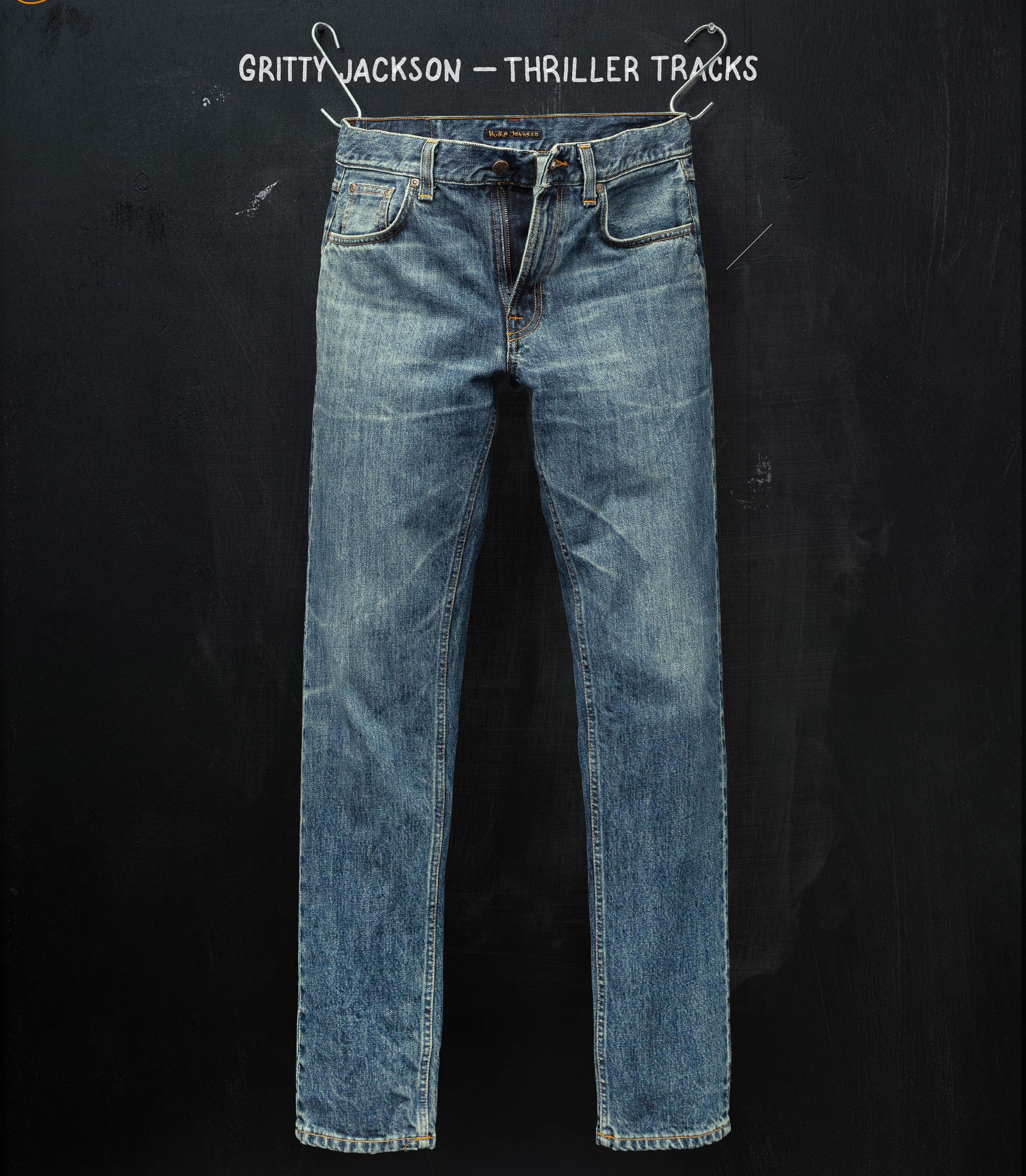Faded blue jeans hanging against a dark background, with text "Gritty Jackson - Thriller Tracks" at the top.