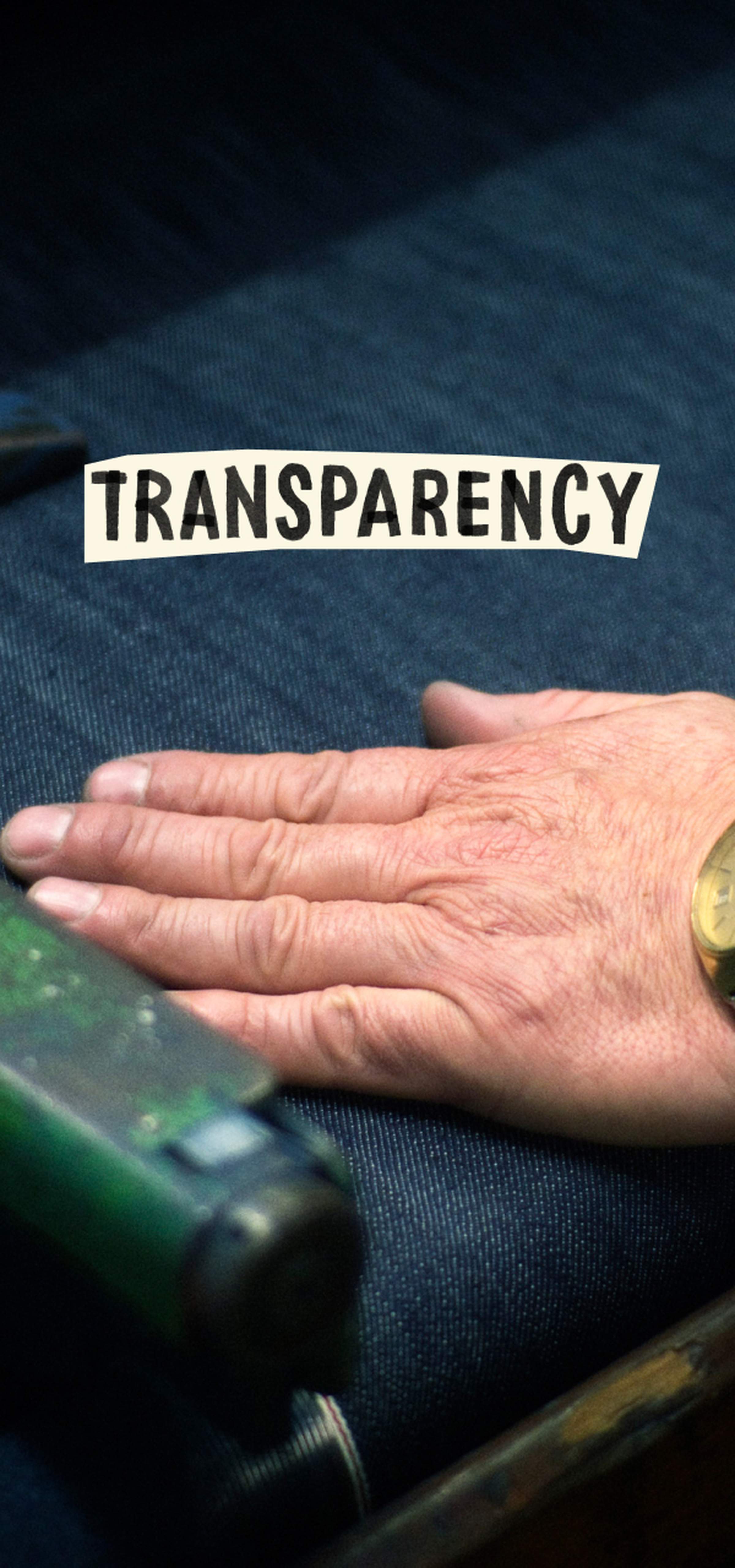 A hand with a watch rests on denim fabric with the word "TRANSPARENCY" above, suggesting attention to detail and honesty in craftsmanship.