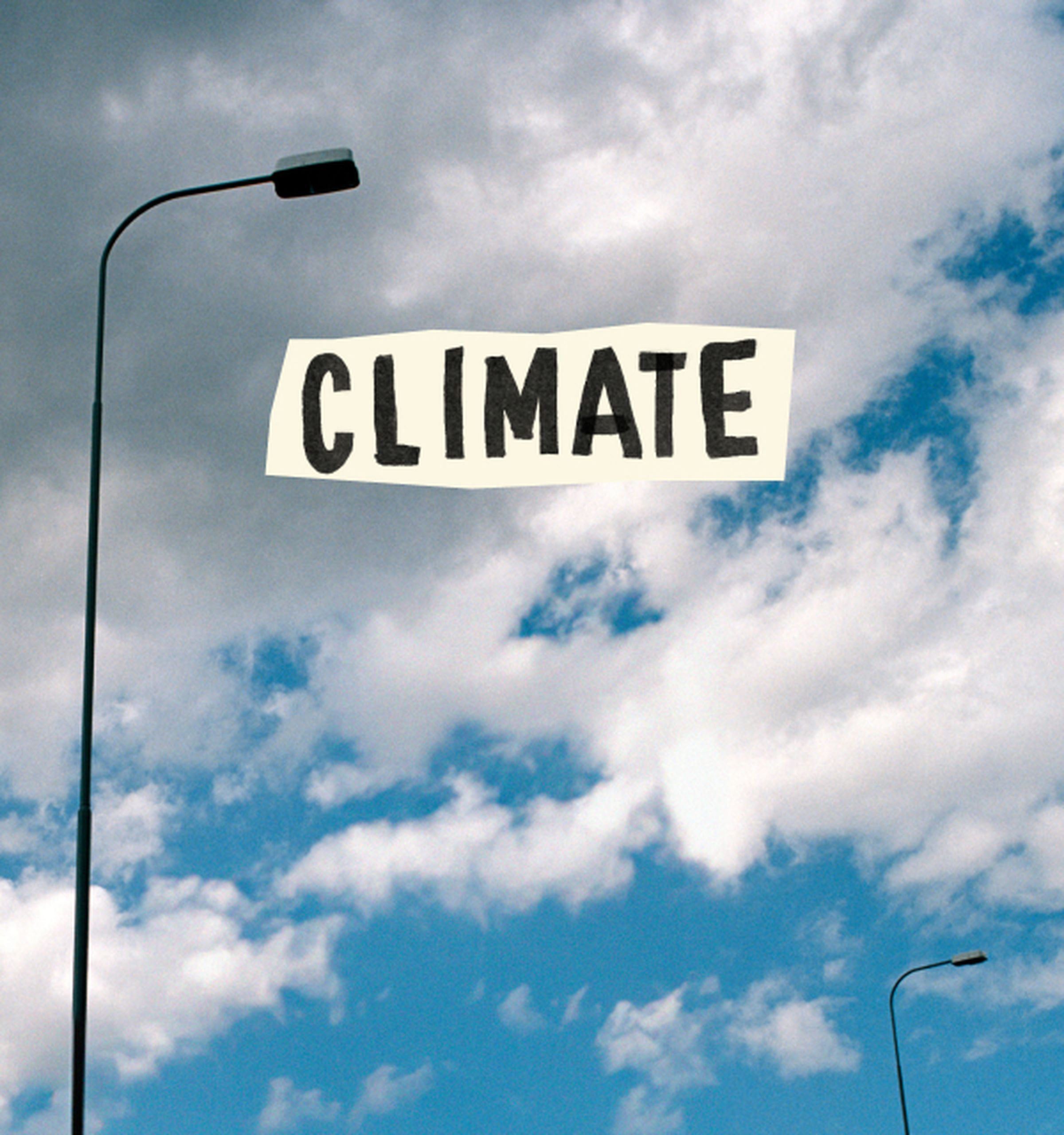 Two streetlights against a partly cloudy sky with the word "CLIMATE" in bold, cut-out letters in the center.