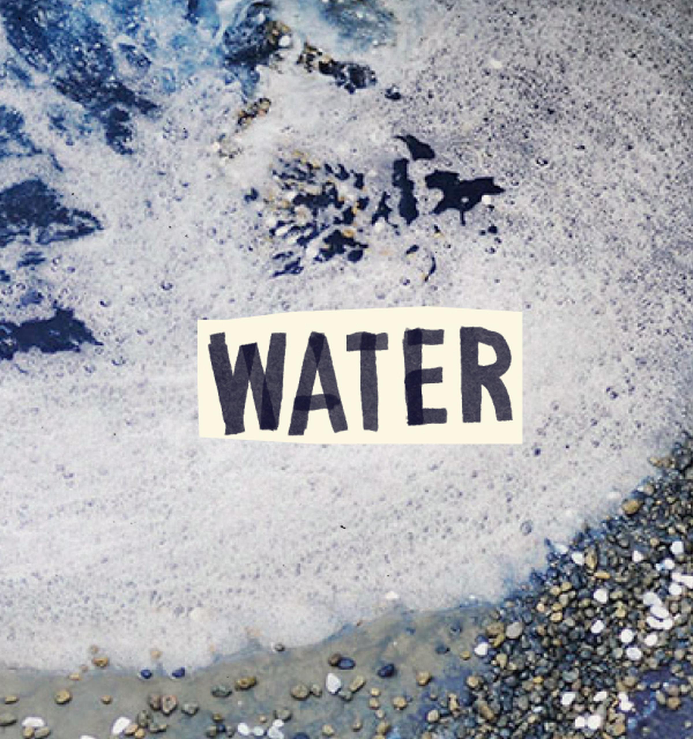 Foamy waves crash onto a pebble-covered shore with the word "WATER" overlaid in bold, black letters.