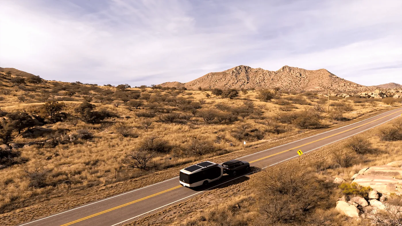 A Pebble Flow being towed through dry hills