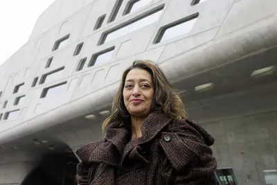 Zaha Hadid outside the Phaeno Science Centre, Wolfsburg, Germany, 2005 © JOCHEN LUEBKE/DDP/AFP, courtesy of Getty Images