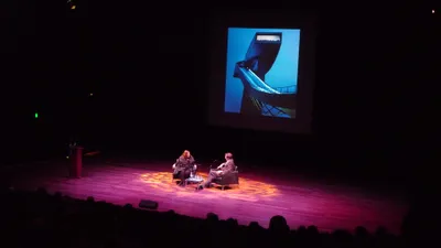 Zaha Hadid speaking at a conference on Bergisel Ski Jump, 2011 © Brian Ma Siy