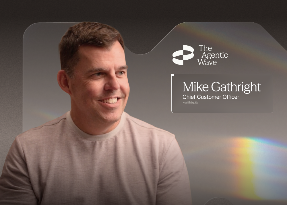Smiling man in a light shirt next to text with the logo "The Agentic Wave" and position title "Chief Customer Officer". Rainbow light effect in background.