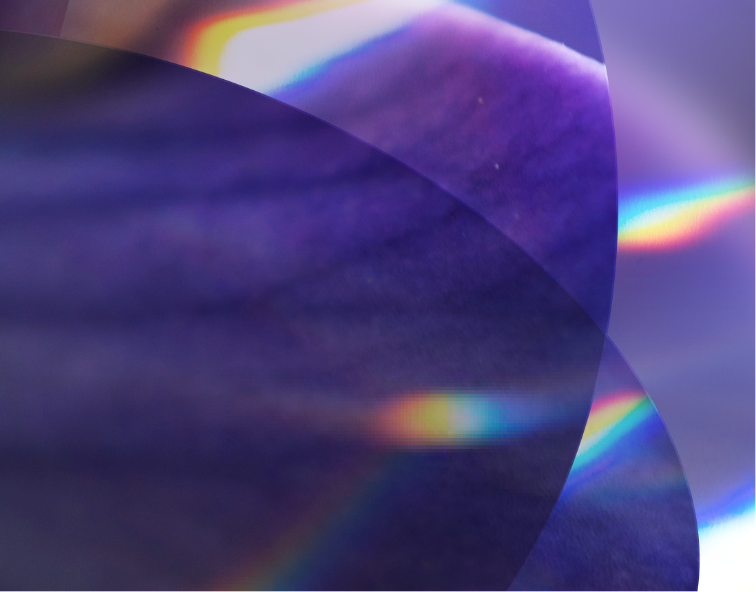 Abstract composition featuring overlapping, translucent purple and blue shapes with subtle rainbow light effects.