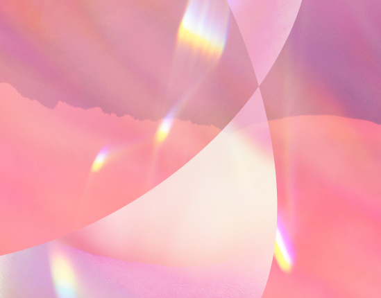 Abstract image with soft pink and purple hues, translucent overlapping shapes, and radiant rainbow light effects.