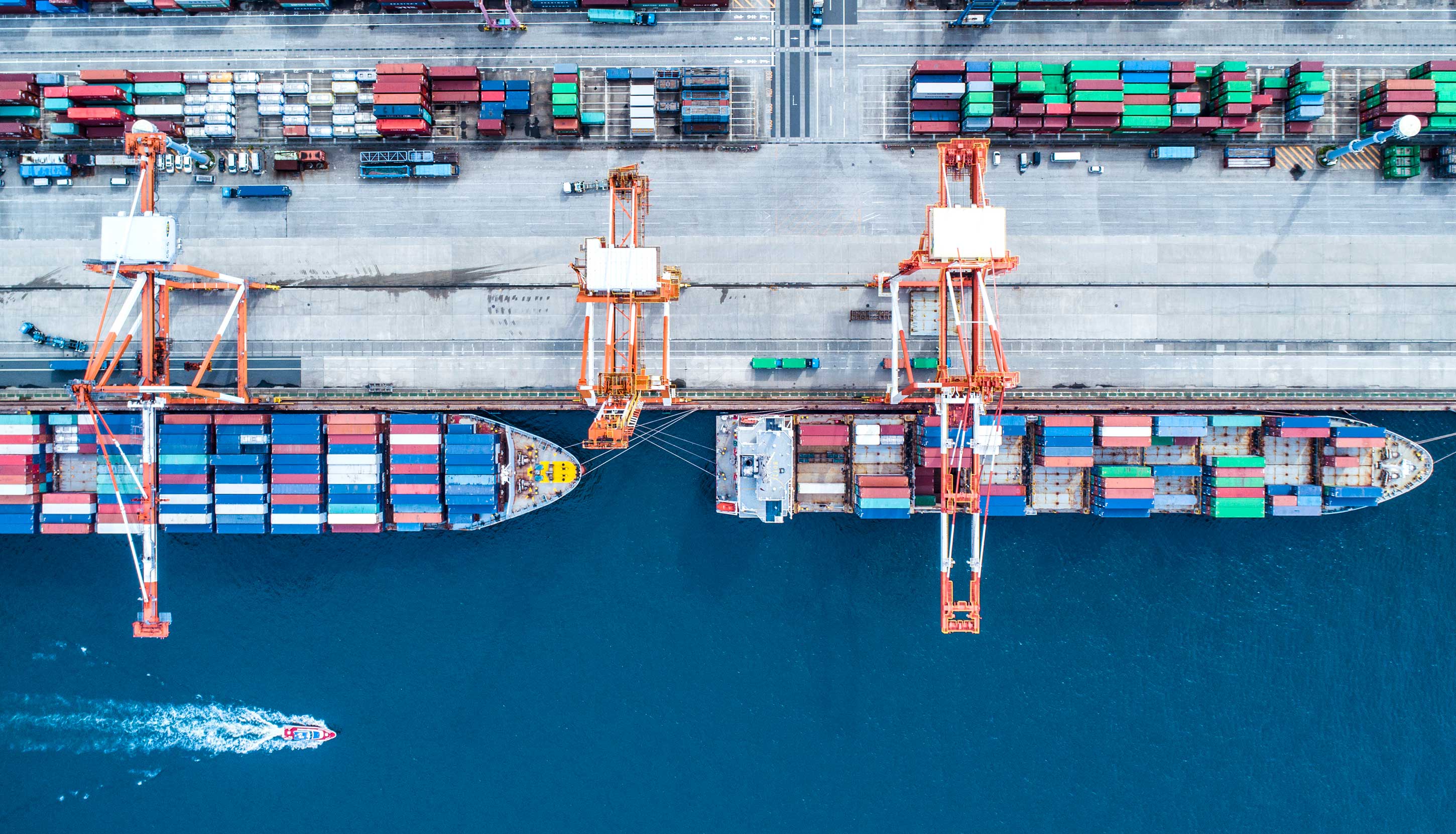 Docked boats in the container yard.
