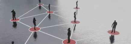 Silhouettes on connected red circles over a reflective surface, symbolizing network and communication.