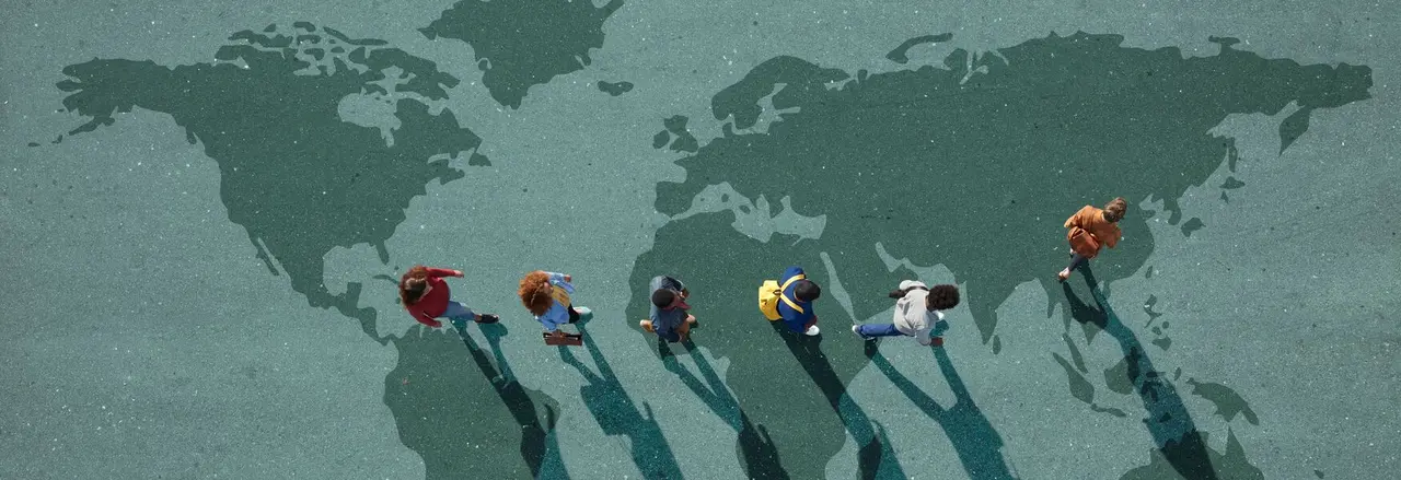 Group of young adults, photographed from above, on various painted tarmac surface, at sunrise.