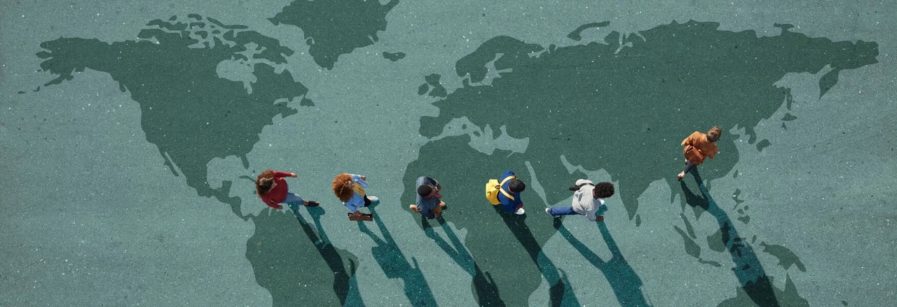 Group of young adults, photographed from above, on various painted tarmac surface, at sunrise.