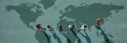 Group of young adults, photographed from above, on various painted tarmac surface, at sunrise.