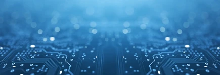 Close-up of a blue electronic circuit board with glowing lines and dots, symbolizing technology and connectivity.
