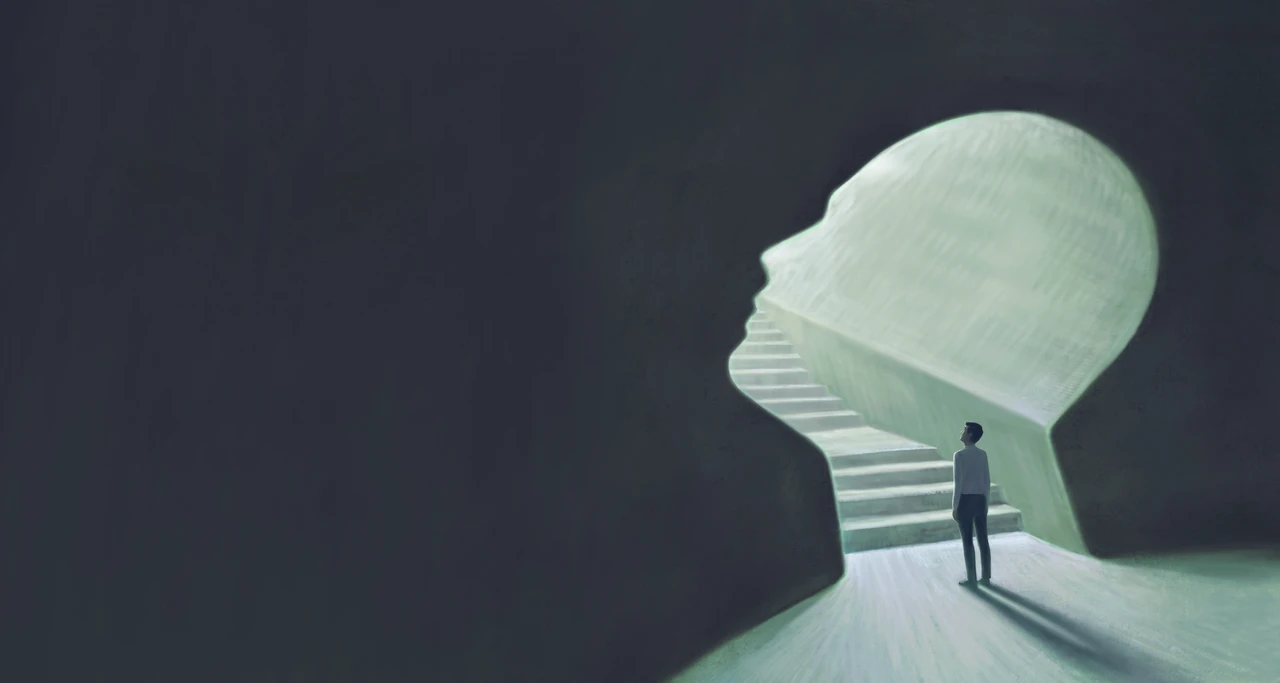 A person stands at the entrance of a staircase shaped like a human head, symbolizing introspection and self-discovery.