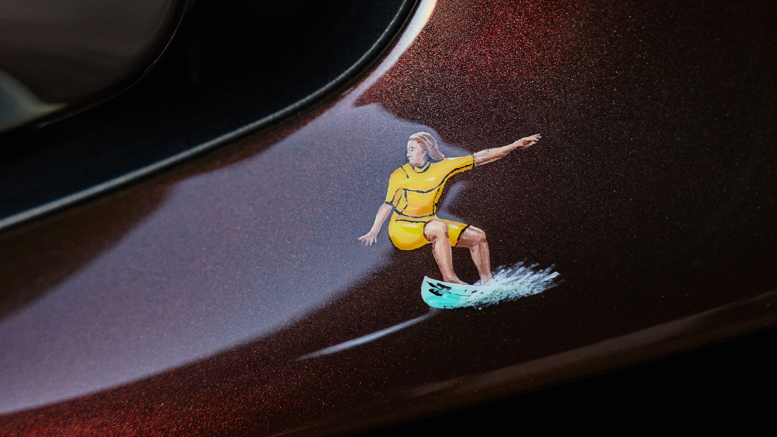 Decal of a surfer.