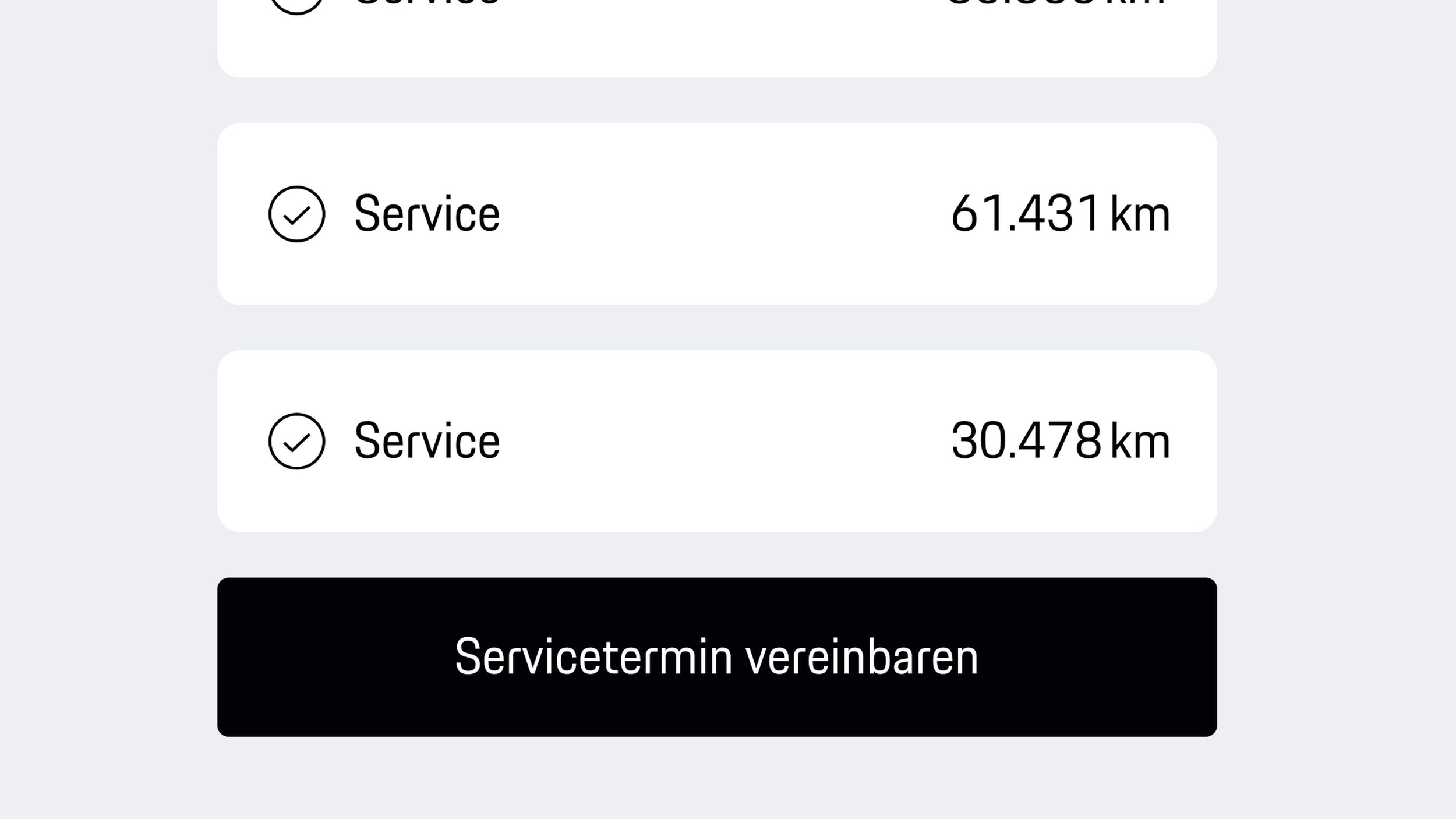 App view showing inspection list with mileage details and black ‘Book appointment’ button for scheduling service.