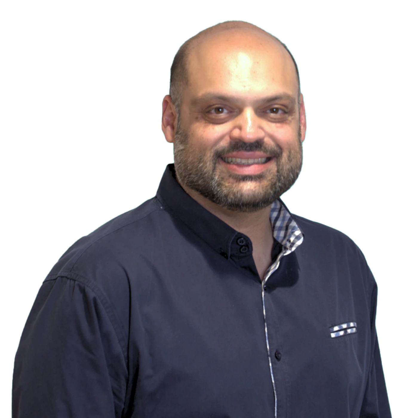 Smiling man with a beard wearing a dark button-up shirt, standing against a plain white background.