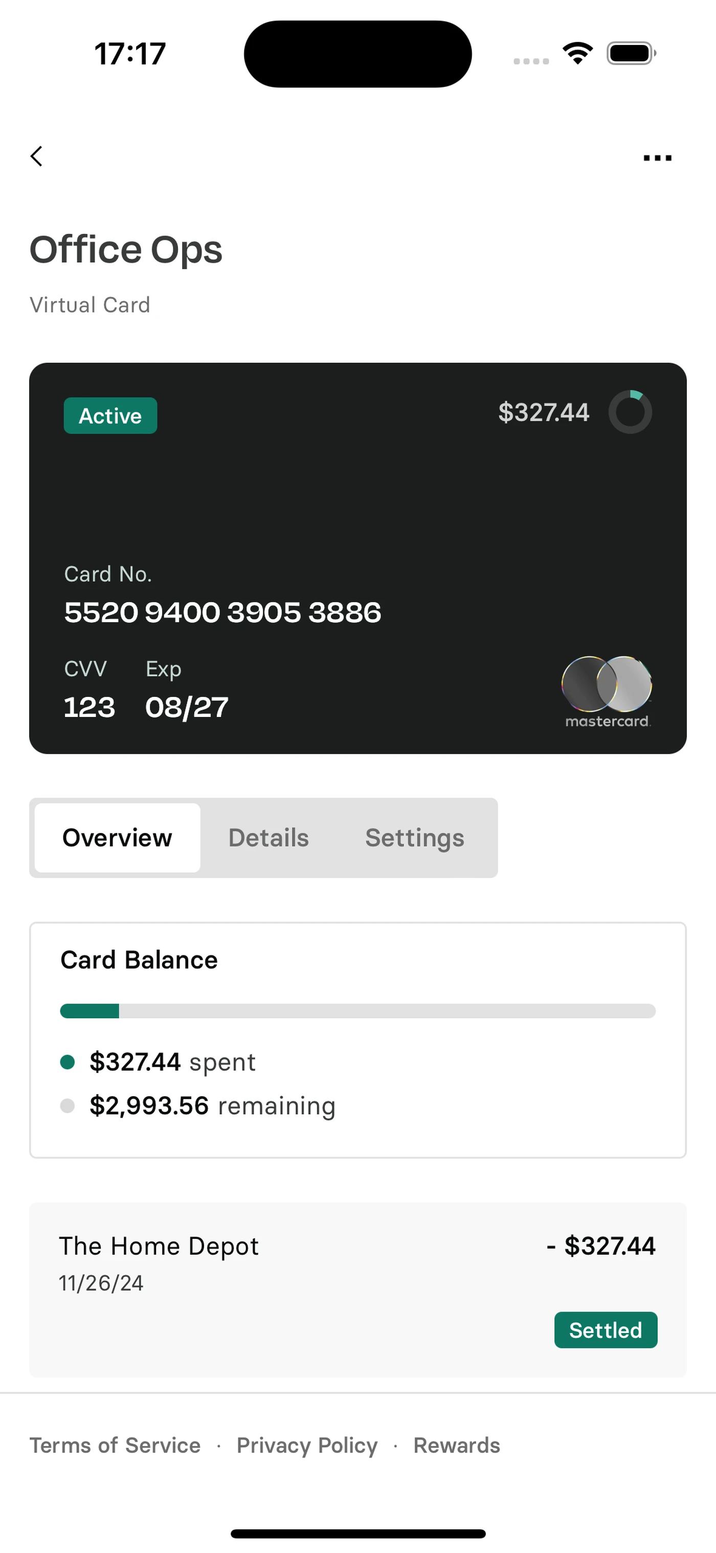 Screenshot of a virtual card summary showing a balance of $327.44 spent, $2,993.56 remaining, and a recent transaction at The Home Depot.