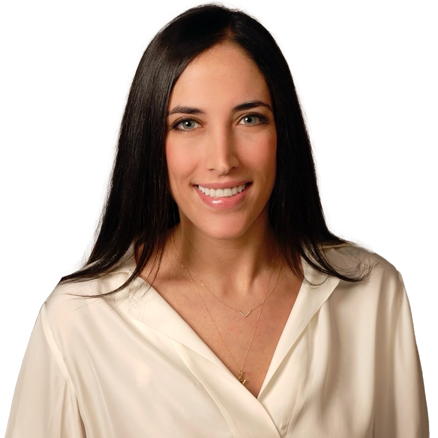 a smiling woman with clear skin in a white blouse