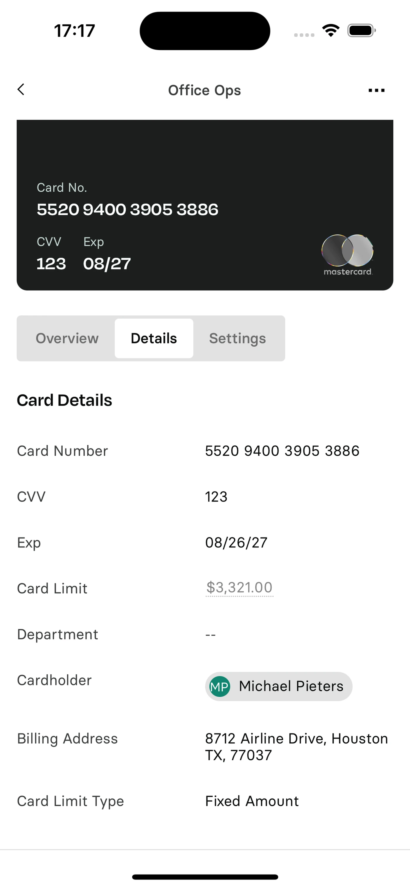 Mobile banking app screen displaying a Mastercard with card details, including number, CVV, expiration date, cardholder name, and billing address.