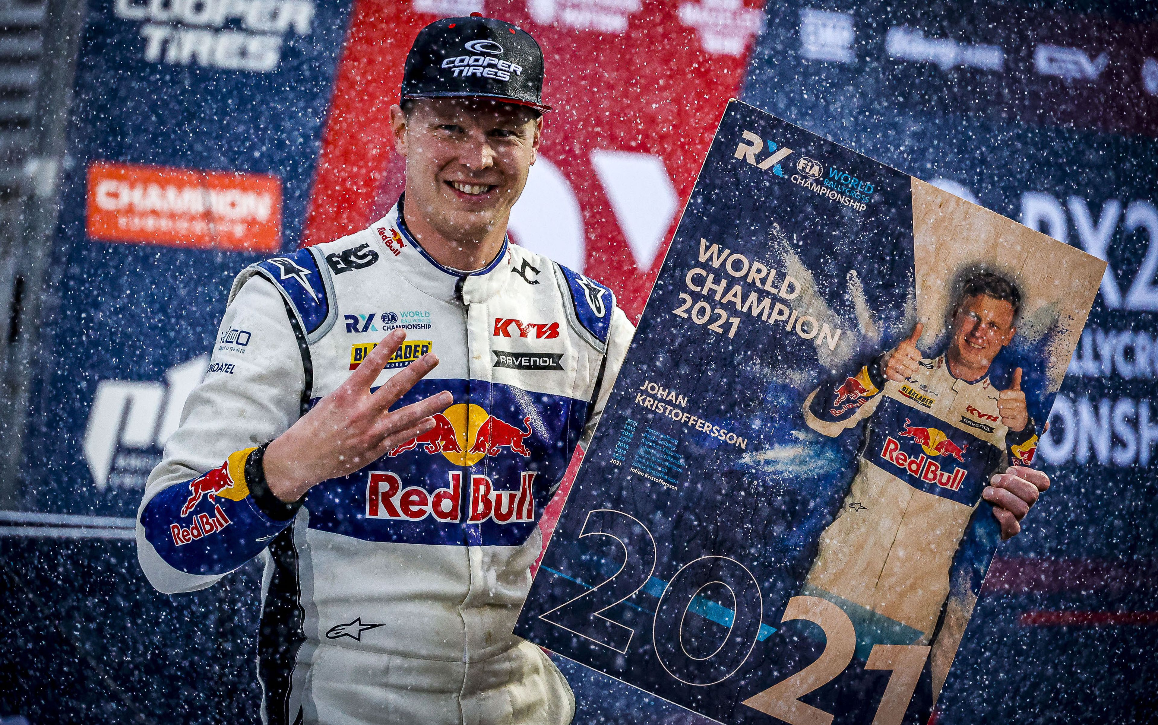 Johan Kristoffersson celebrates clinching a fourth FIA World Rallycross Championship crown at Germany's Nürburgring in 2021