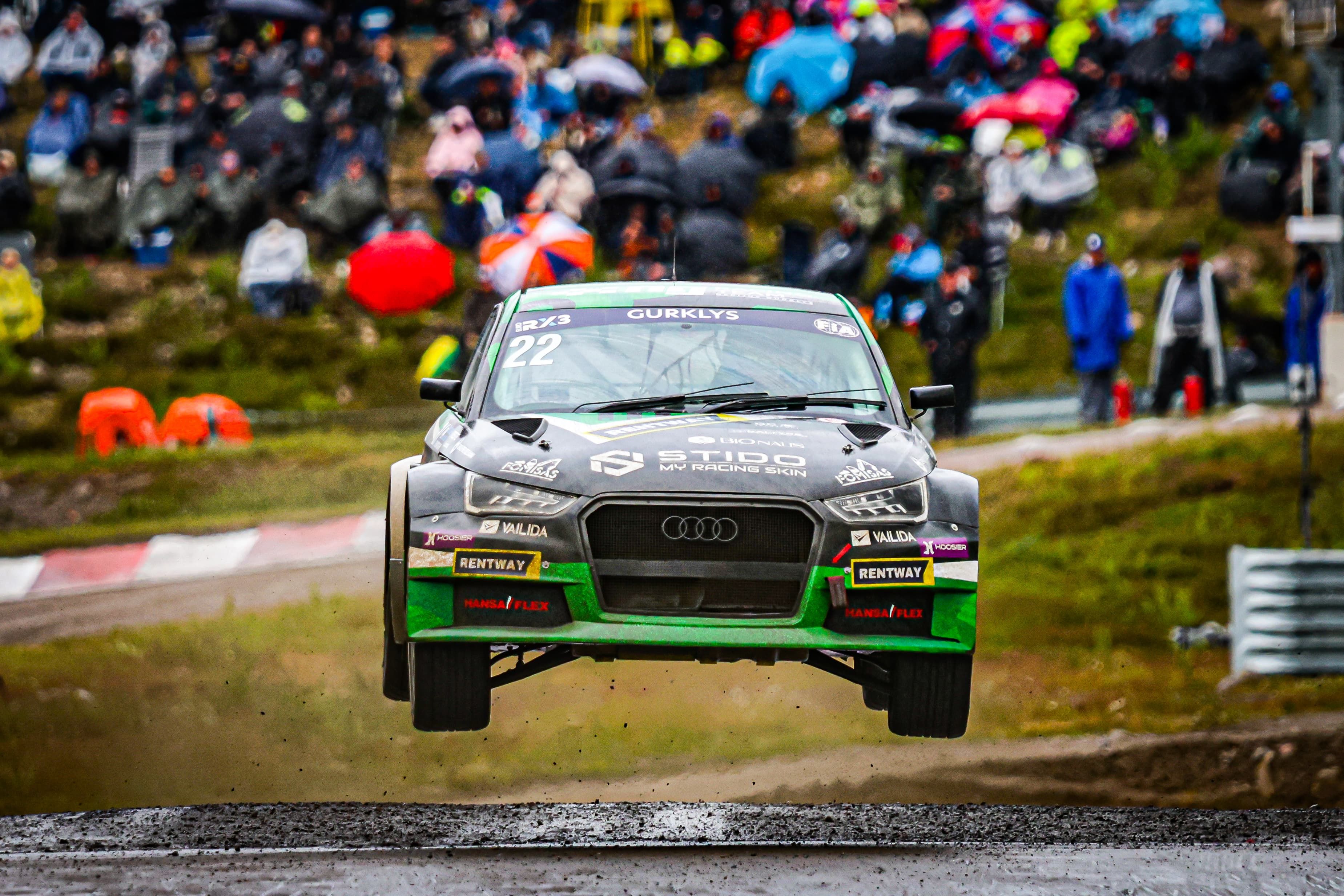 A rallycross car on track