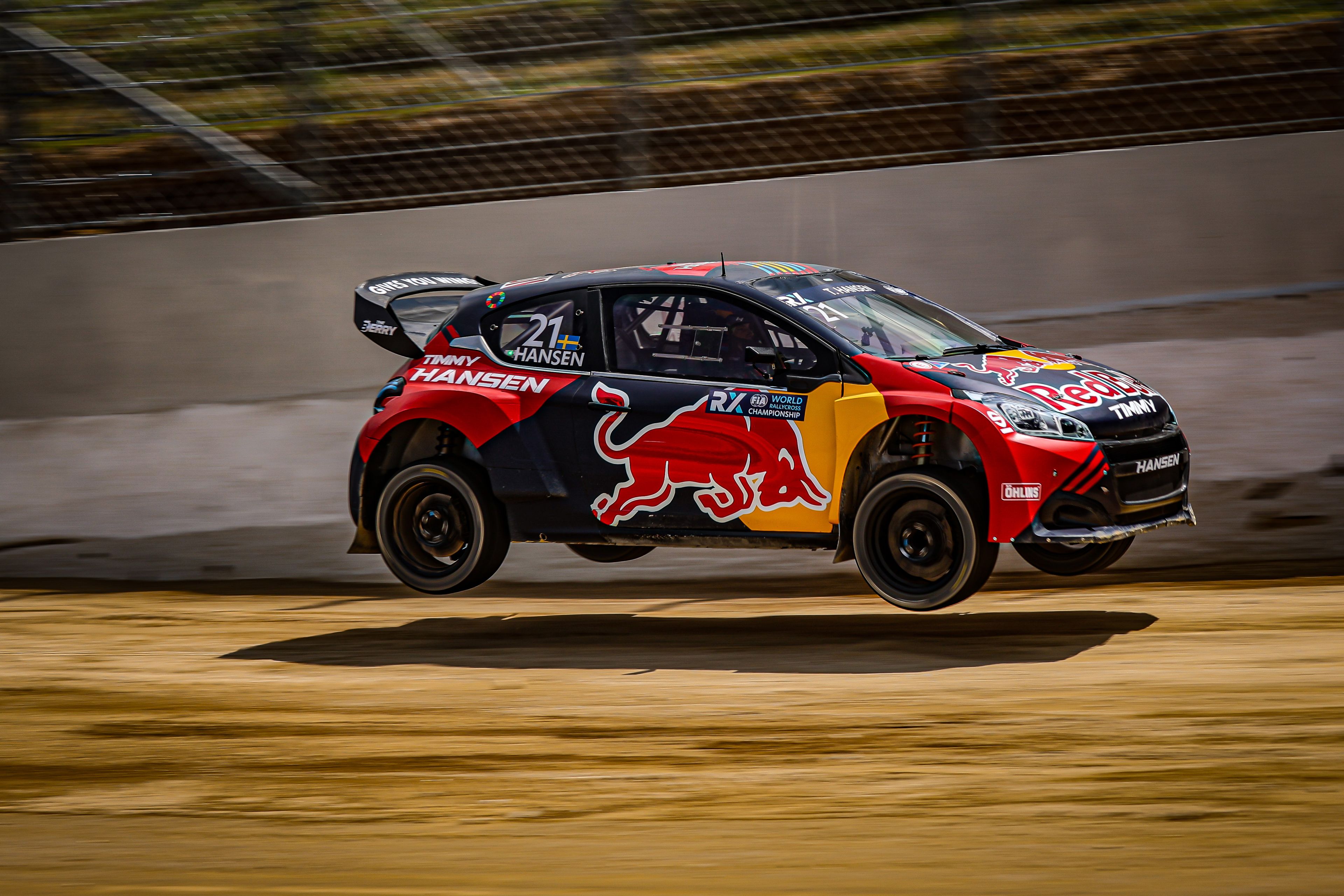 A World RX Car jumping onto gravel at Lousada in Portugal