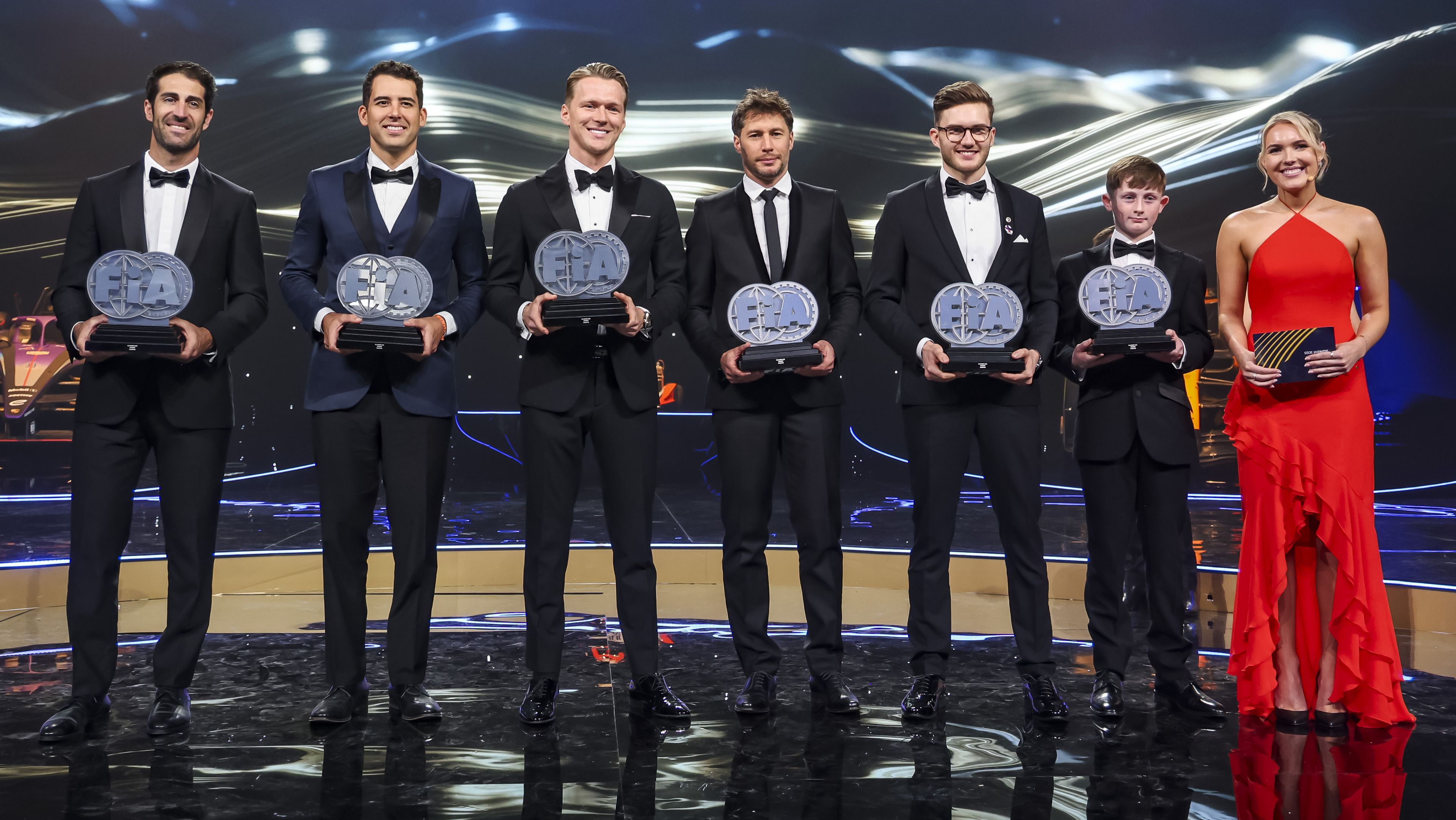 The 2025 FIA 'Action of the Year' award-winners with award presenter, Klara Andersson