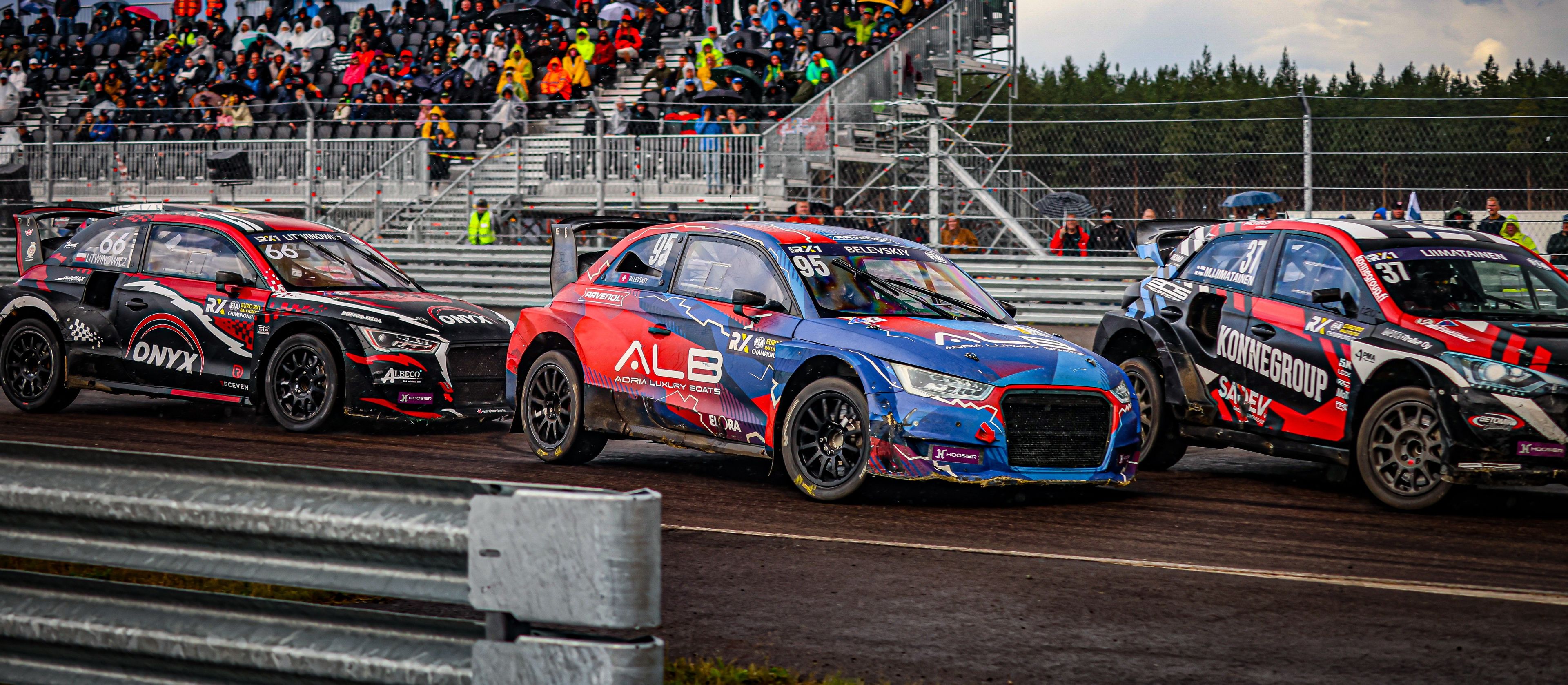 [L-R] Damian Litwinowicz, Yury Belevskiy and Mika Liimatainen locked in Euro RX1 battle at Finland's KymiRing in 2025 [2]