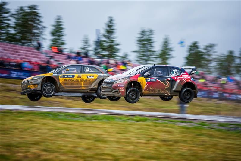 Rx cars in the air over a jump