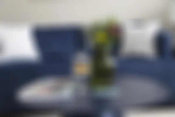 Nicely decorated table in front of a sofa