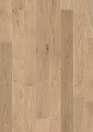 Light oak wood flooring with a natural grain pattern and subtle knots, creating a warm and inviting appearance.
