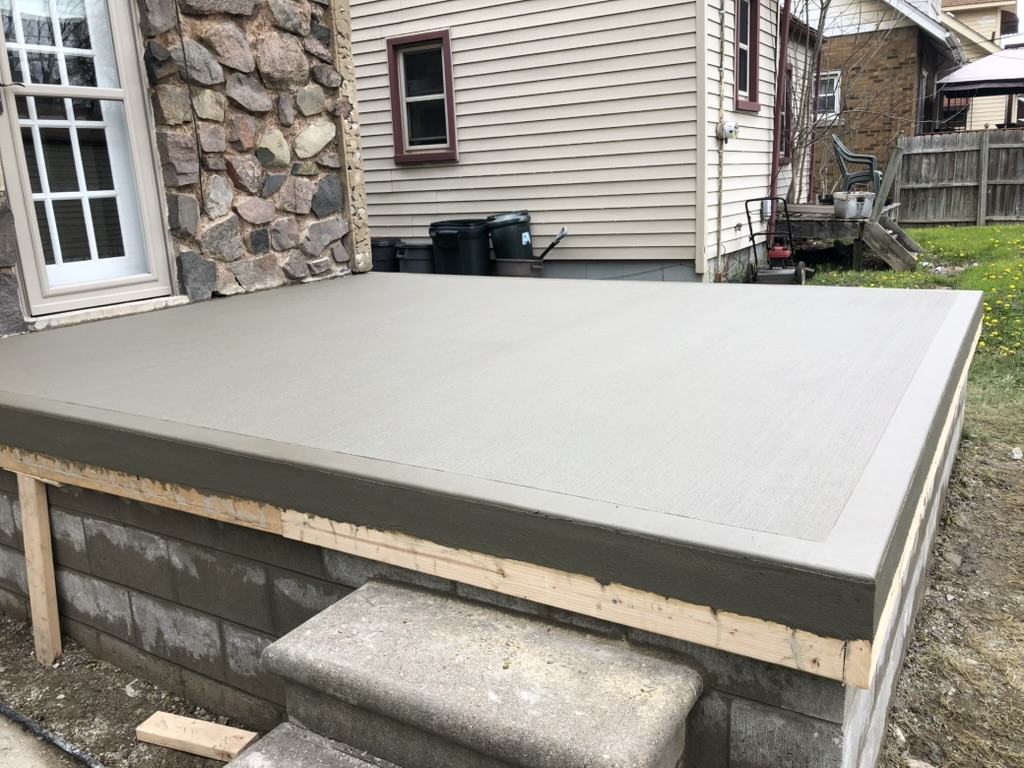 above all masonry and construction patio