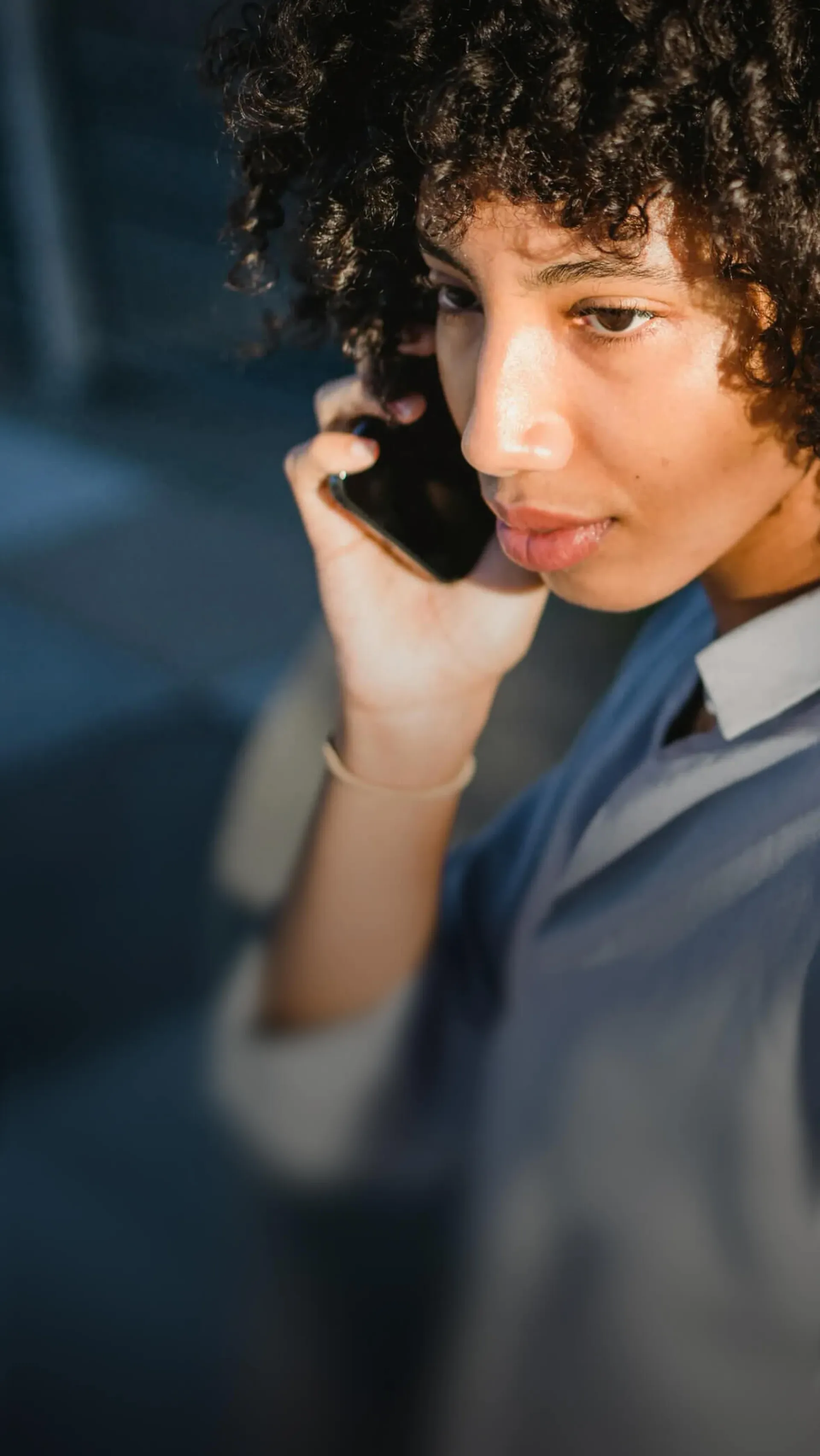 Customer on phone (mobile crop)