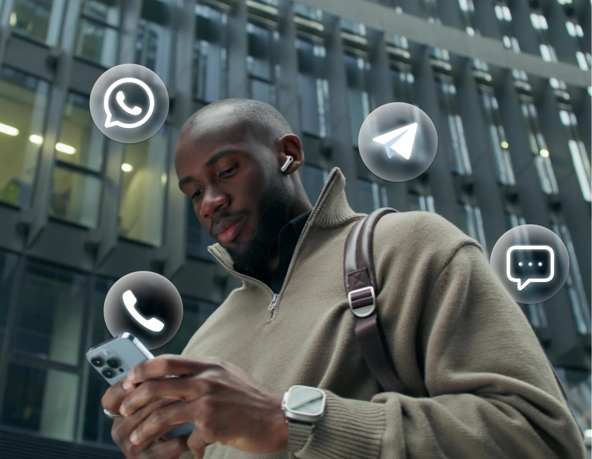 Person checking a smartphone with WhatsApp, Telegram, call and chat icons around them