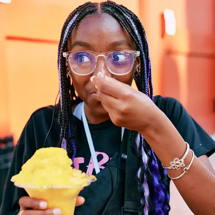 student eating gelato on tour