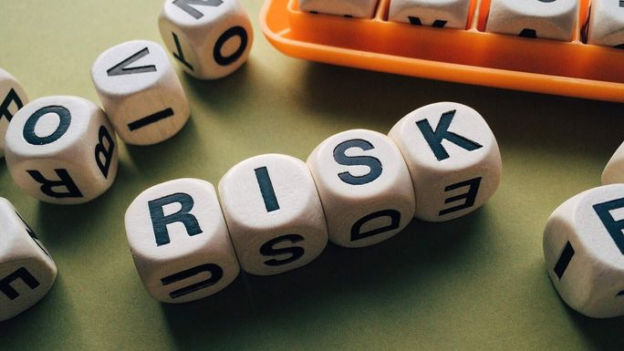 Dice spelling RISK