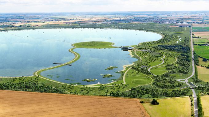 Aerial view of reservoir with a grassy central island