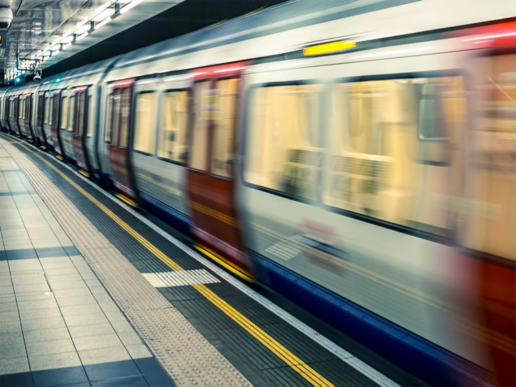 Train passing through underground station