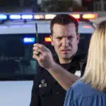 Thumbnail: Woman with police