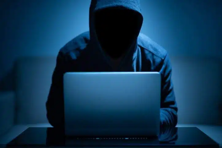 Hacker on laptop