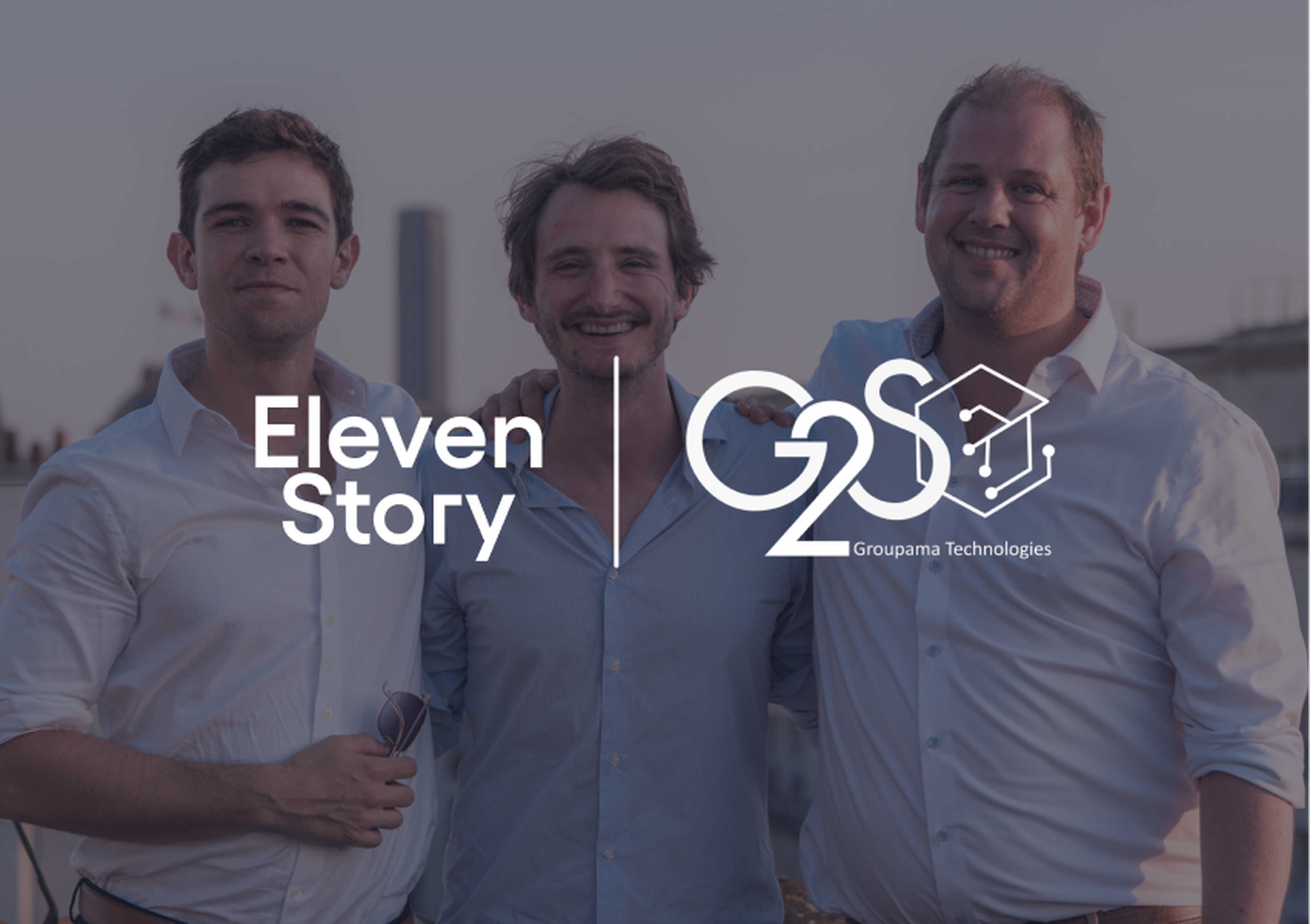 Three men standing closely together smiling, with logos overlayed: Eleven Story on the left and G2S Groupama Technologies on the right.