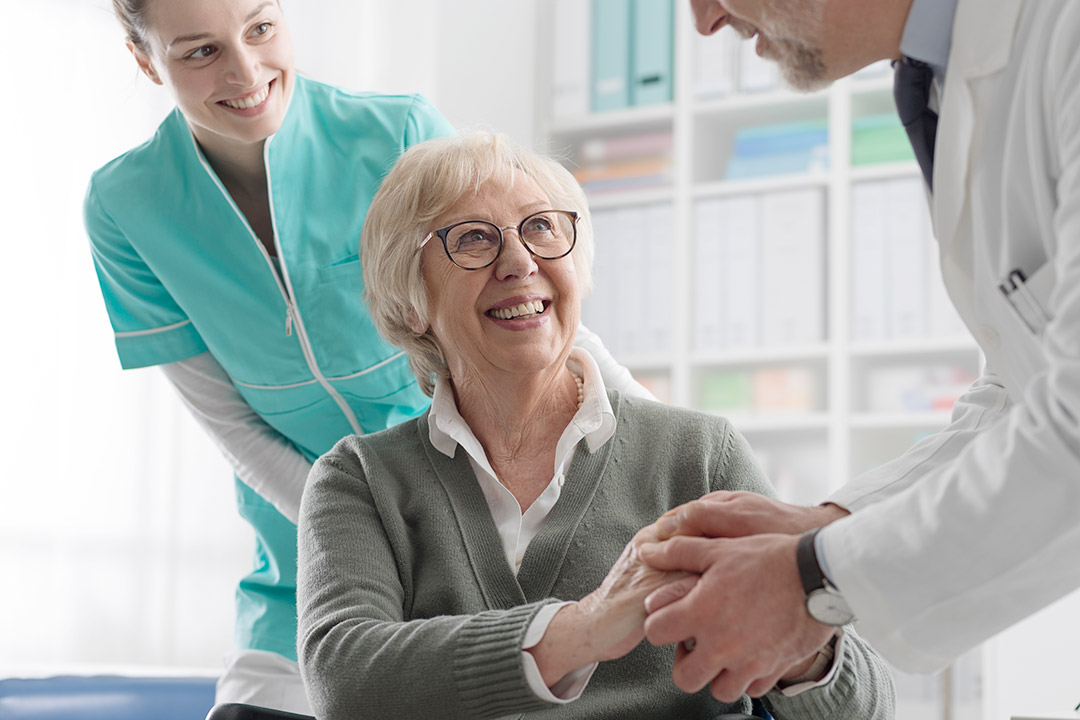 Healthcare professionals providing support to a patient