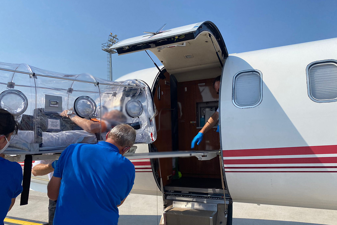 A patient being placed on an air ambulance