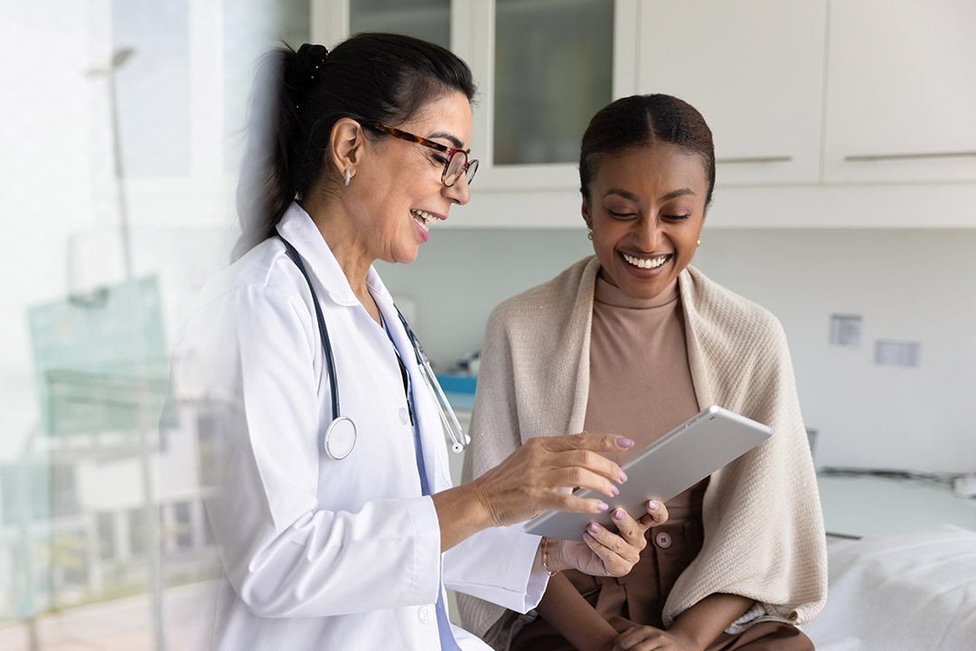 A doctor speaking to a patient