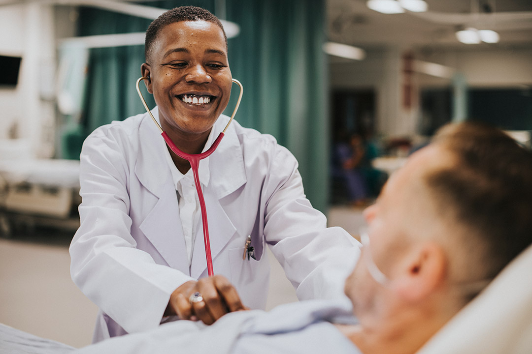 A medical professional monitoring a patient's health