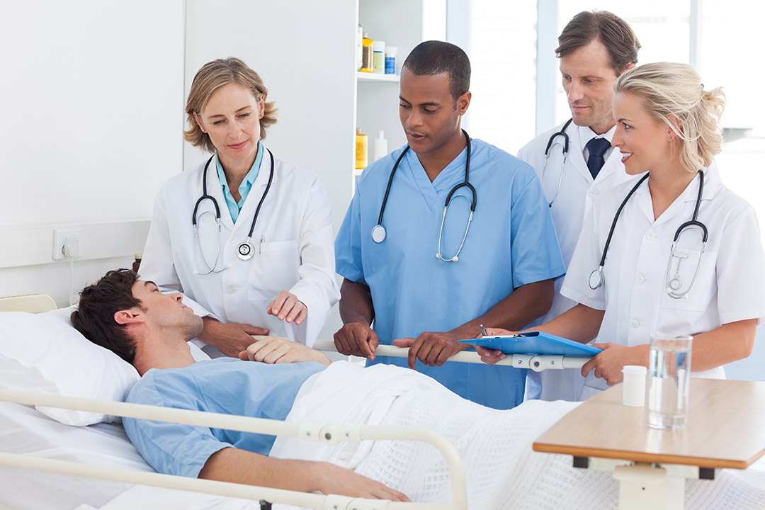 Medical professionals taking care of a patient